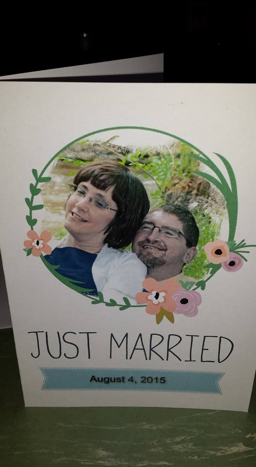A card that reads Just Married with a picture of Kate and David Chapple.