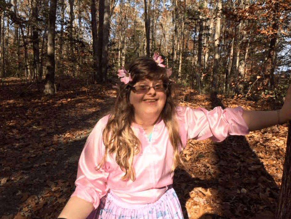 Sara Ruh posing in the Rural Woods of Virginia.