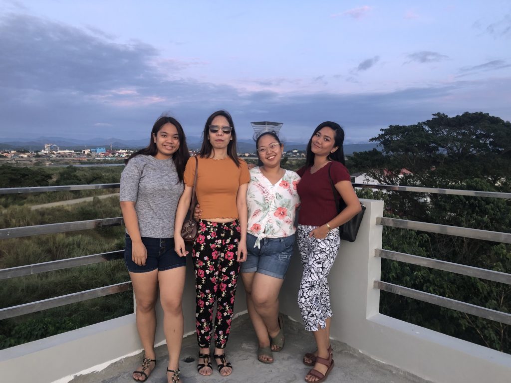 Jasmin Ambiong posing with friends.